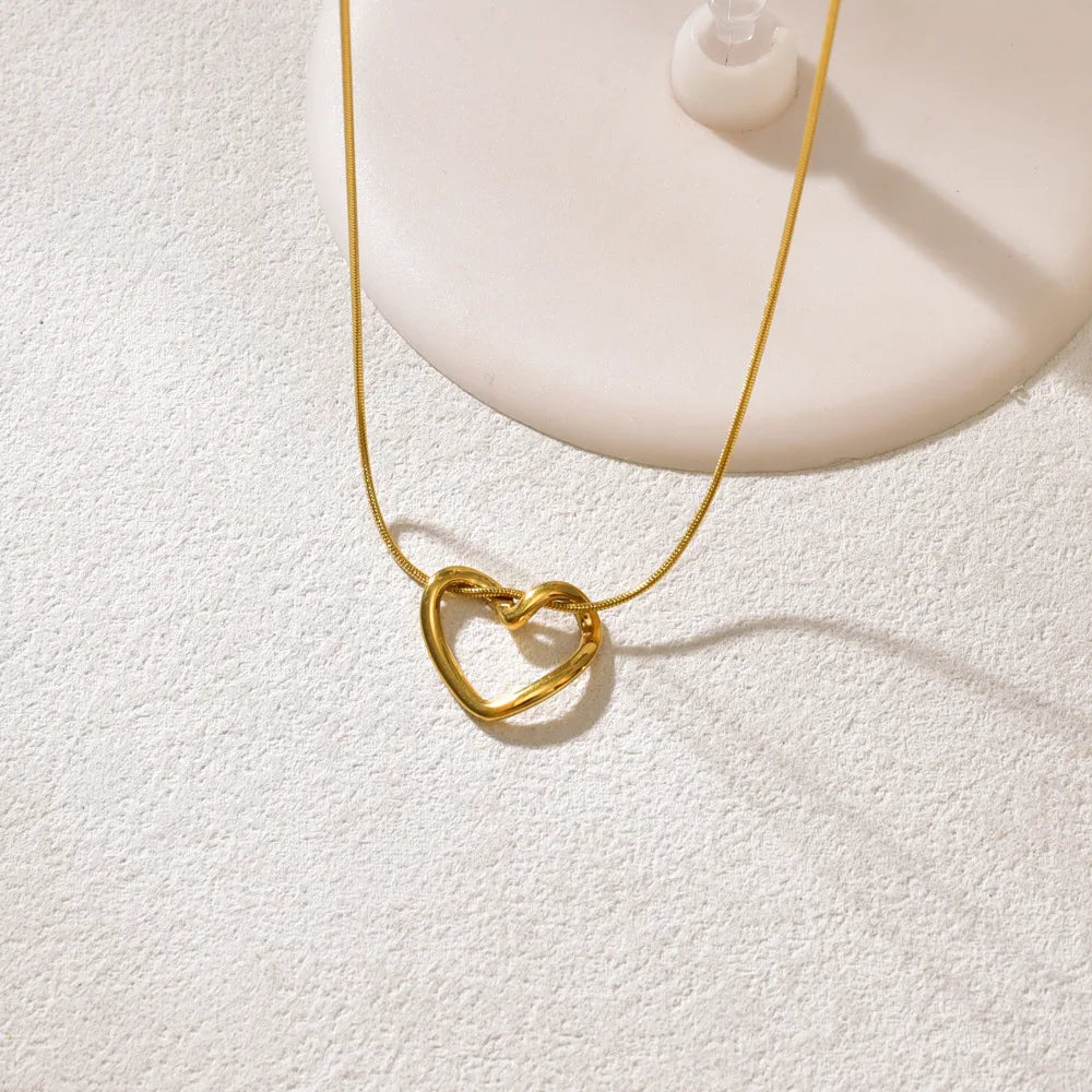 L40 titanium steel hollow heart necklace for women with a light luxury design, heart