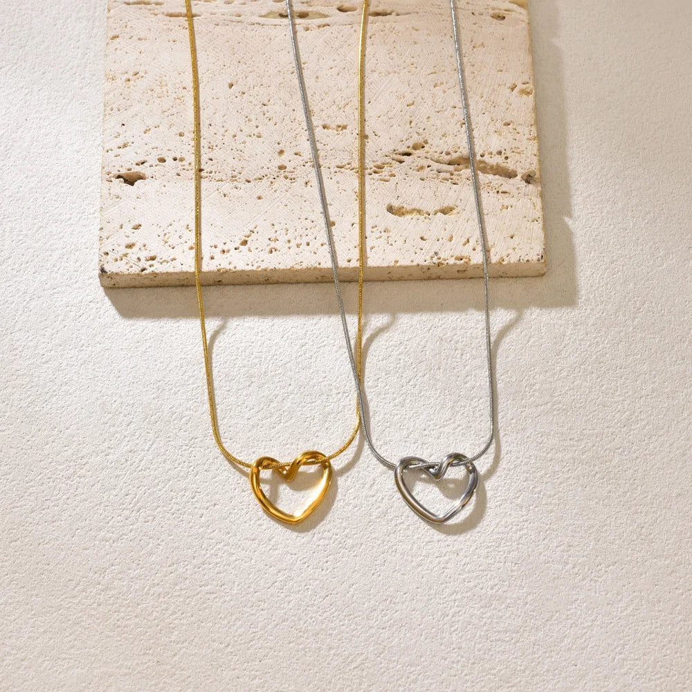 L40 titanium steel hollow heart necklace for women with a light luxury design, heart